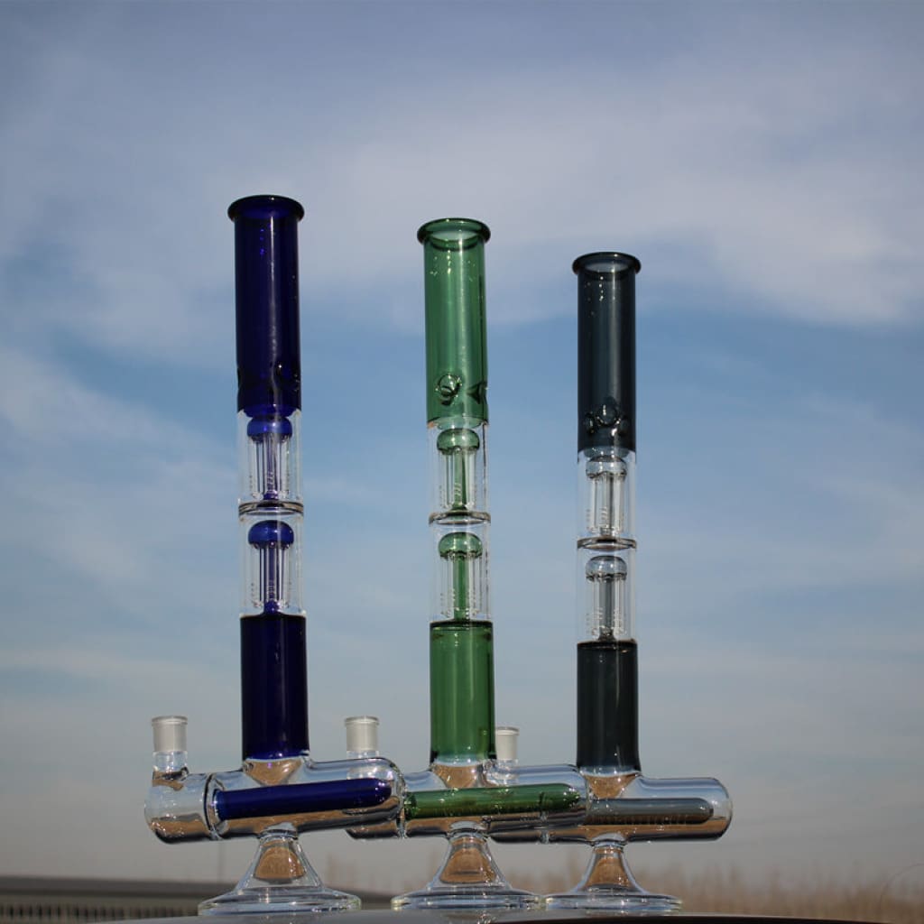 Dual arm percolated glass water bong in blue, green, and gray with percolators and bases