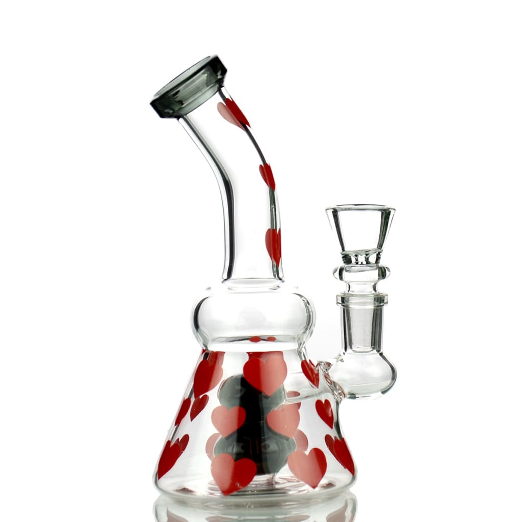 Glass water pipe adorned with girly bong heart stickers for the sophisticated smoker