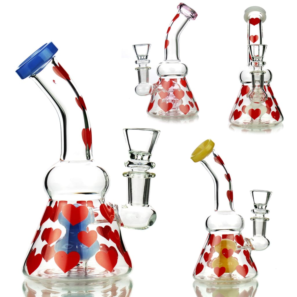 Glass water pipes with red heart patterns from Girly Bong Heart Stickers for sophisticated smoker