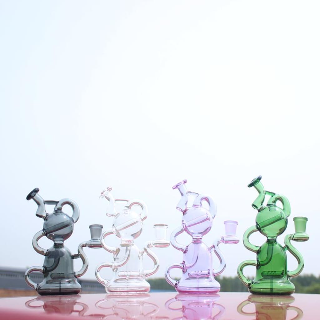 Four colorful glass bongs for a smooth smoking experience with our mini water pipe recycler style