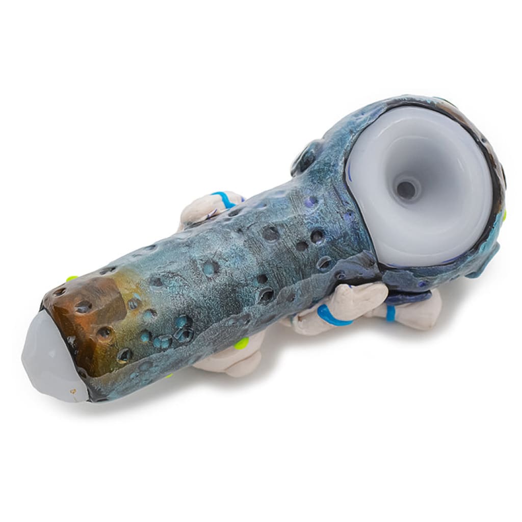 Spaceman handpipe with blue-green textured body and white ends - Cosmic Clay Companion