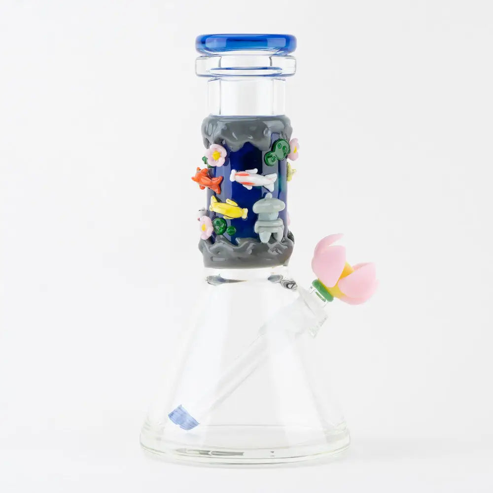 Empire Glassworks Baby Beaker Koi Pond bong with blue tint and fish details