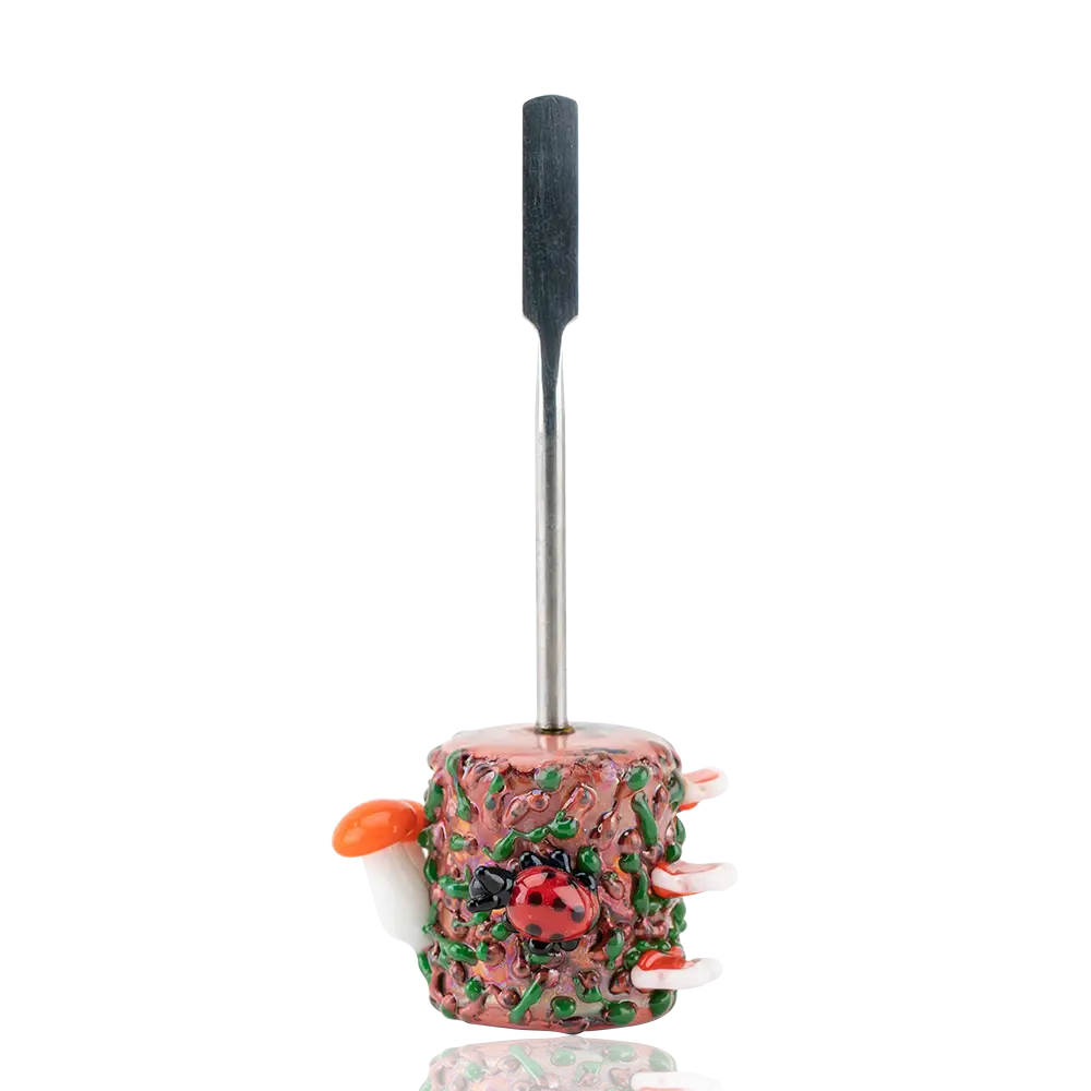 Empire Glassworks Bugs Life dab tool with pink glass base, green speckles, red ladybug