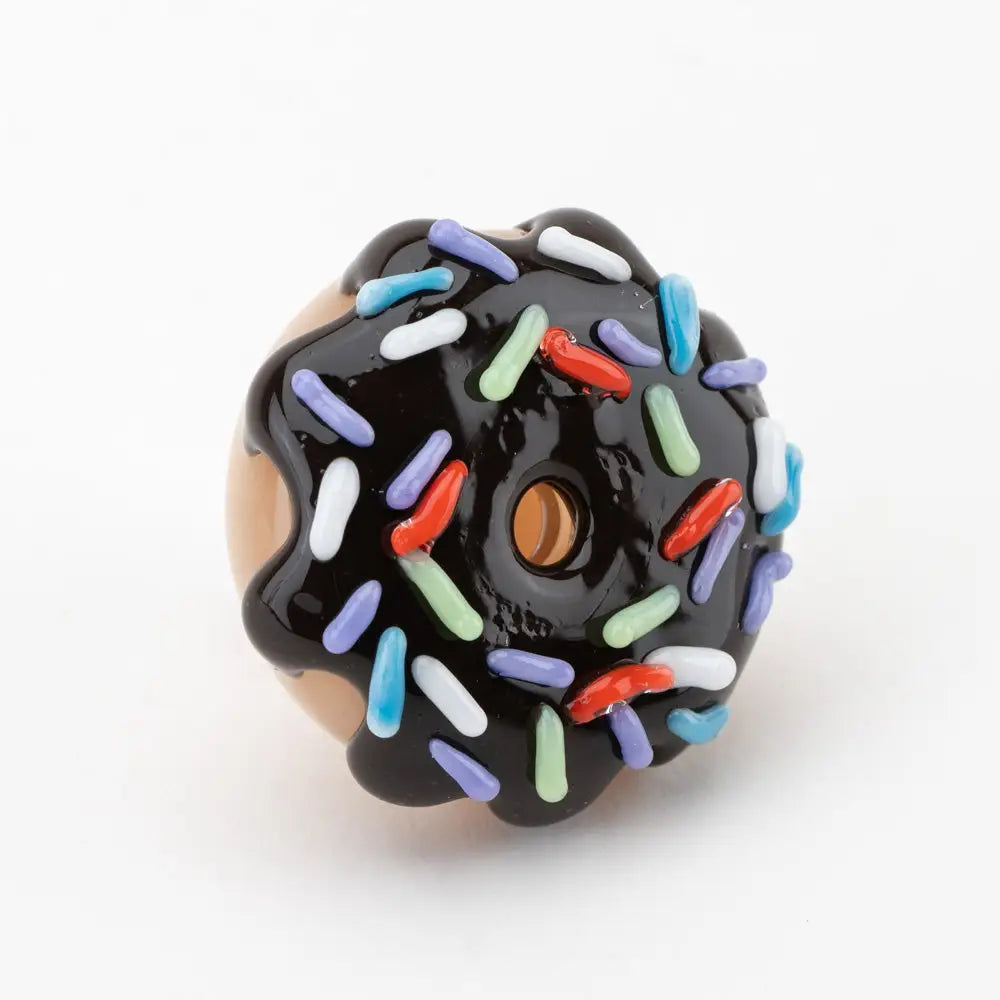 Empire Glassworks glossy black donut spinner carb cap with rainbow sprinkles