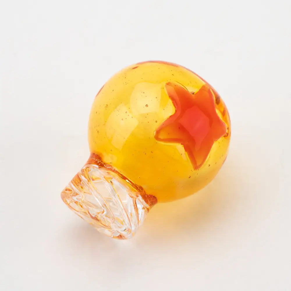 Empire Glassworks Dragon Sphere spinner cap carb cap in amber bottle