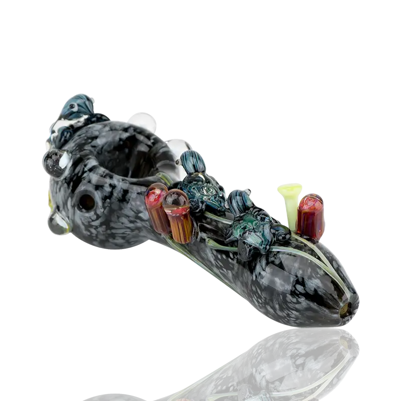 Empire Glassworks East Australian Current spoon pipe with marbled glass and colorful figurines
