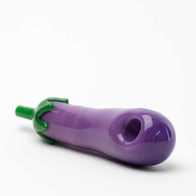 Empire Glassworks eggplant glass hand pipe with purple glass and green stem