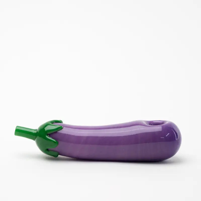 Empire Glassworks eggplant glass hand pipe with purple glass and green stem