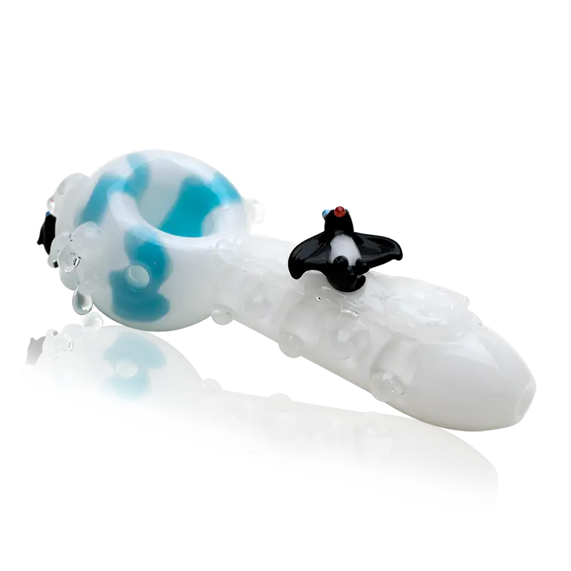 Empire Glassworks Icy Penguins spoon pipe with translucent white glass and black penguin