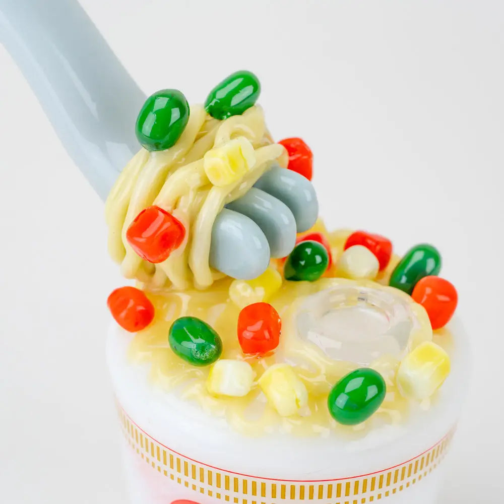 Empire Glassworks mini dab rig with whimsical pasta noodles and candy toppings