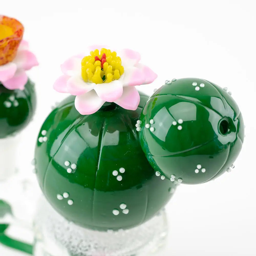 Empire Glassworks mini dab rig with green glossy ceramic peyote cactus and pink flower
