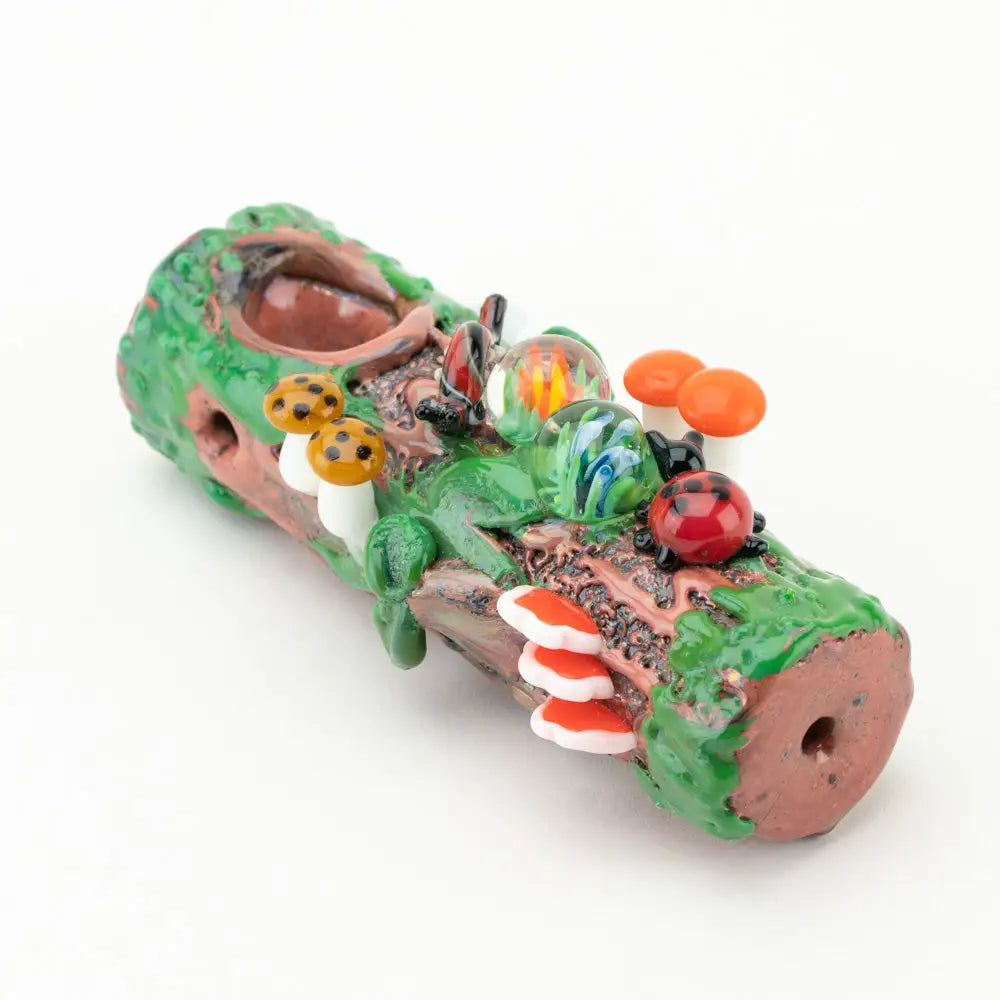 Empire Glassworks mossy log hand pipe with colorful mushrooms and ladybugs