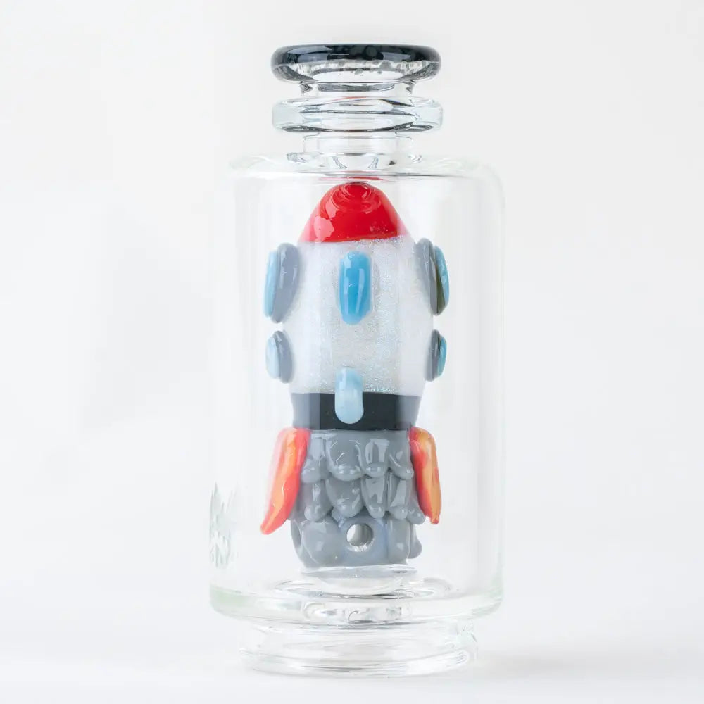 Empire Glassworks Peak Attachment Rocket Ship in clear glass bottle
