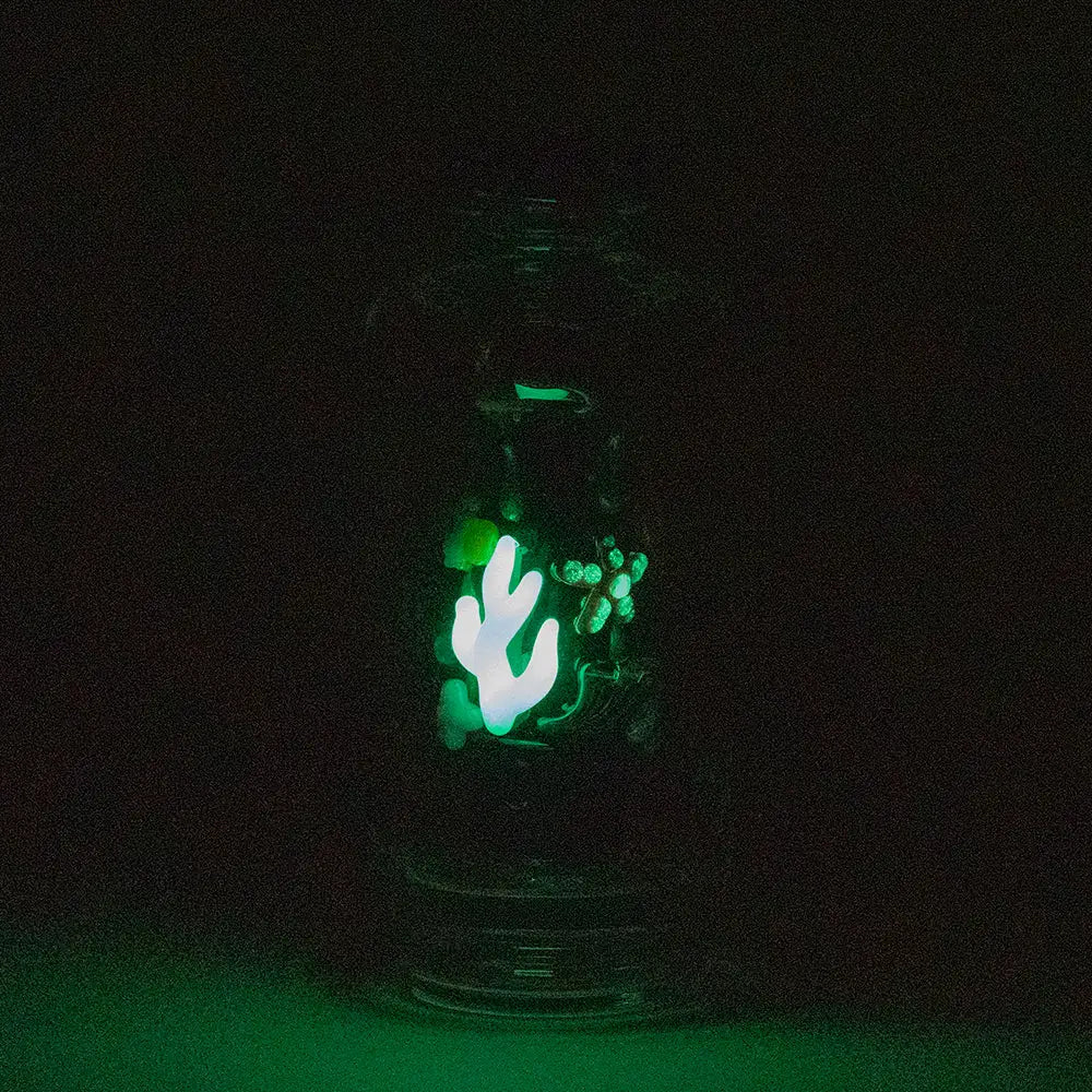 Empire Glassworks Peak Attachment glowing green lantern with white cactus in clear glass