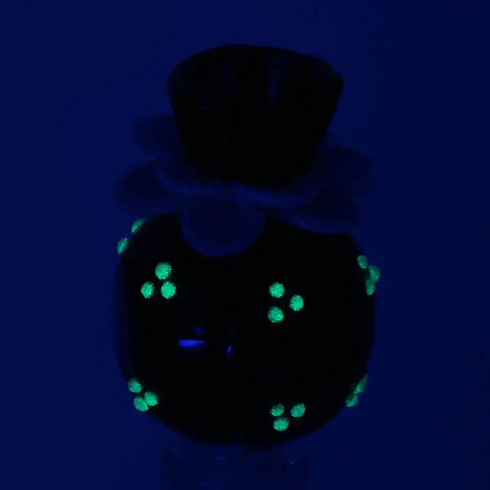 Empire Glassworks Peyote Cactus black glass perfume bottle with glowing green dots
