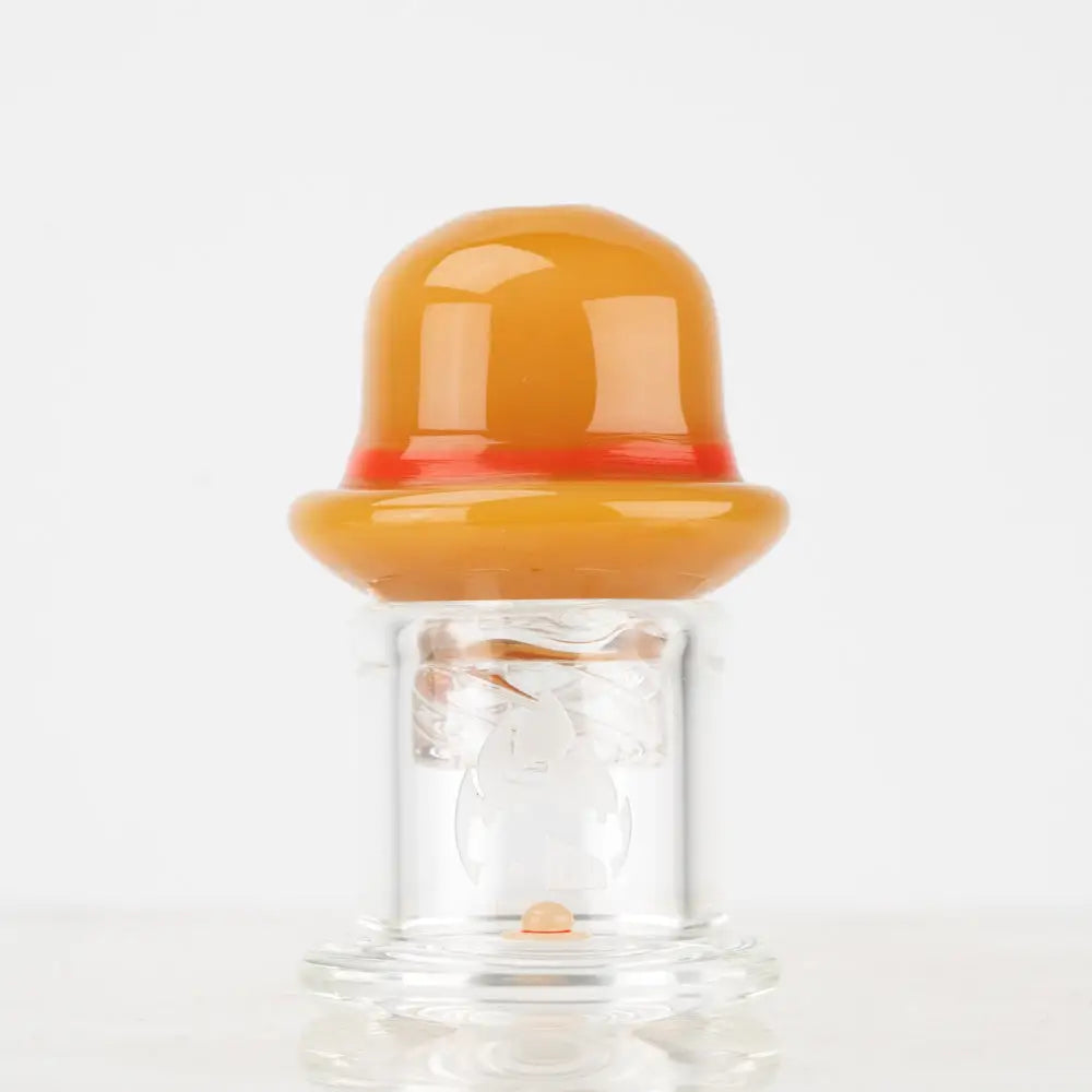 Empire Glassworks translucent orange spinner cap carb cap on clear base