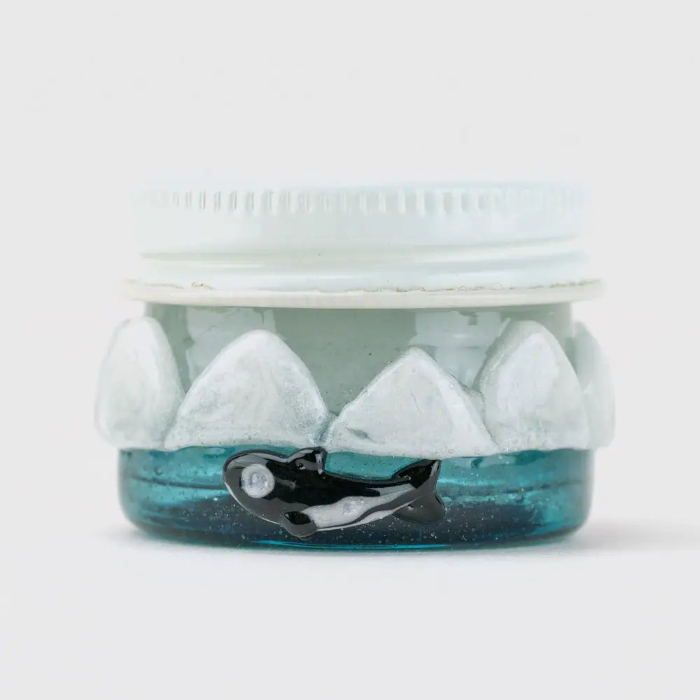 Empire Glassworks Terp Jar Avenge the Arctic with orca in blue jar