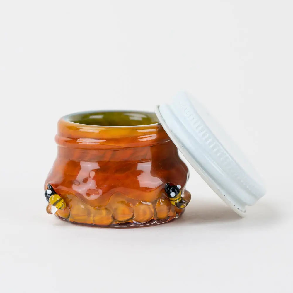 Empire Glassworks Terp Jar Honeycomb with glossy amber jar, white ribbed lid, bees and honeycomb details