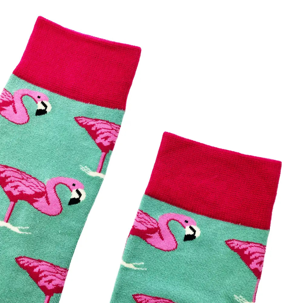 Mint green flamingo socks with pink pattern and red trim for a stylish fit