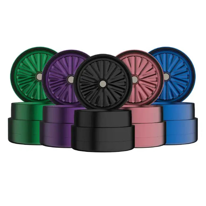 Colorful metal herb grinders with Flower Mill’s Generation Standard rolling paper design