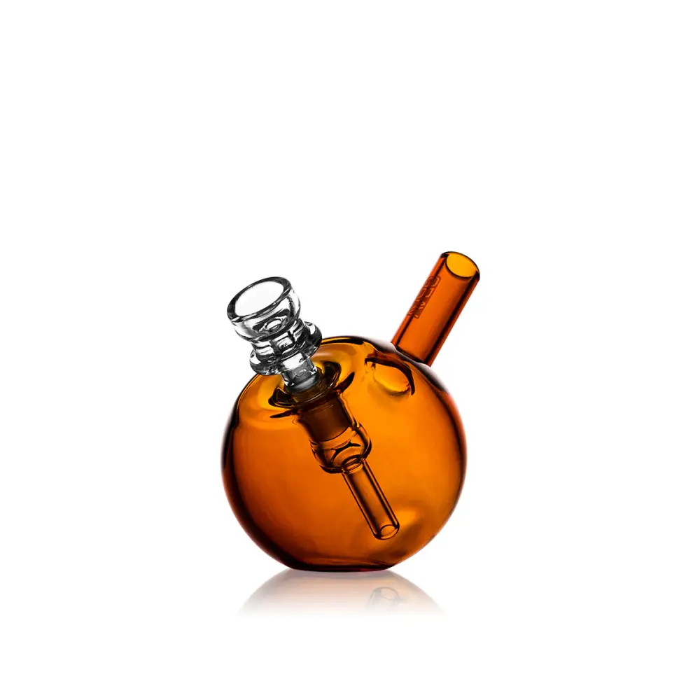 Amber glass sphere water pipe from Grav Spherical Pocket Bubbler for compact use