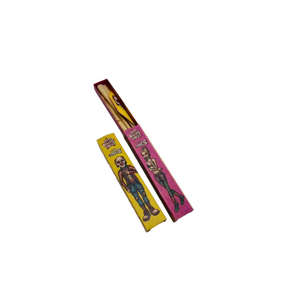 Two Colorful Candy Boxes With Cartoon Skeletons - Lion Rolling Circus Pre-rolled Cones