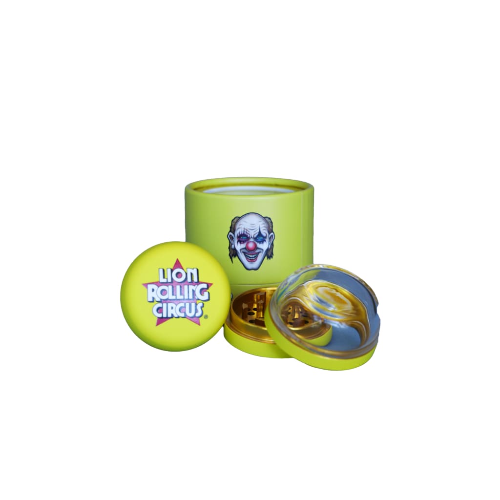 Nuevo grinder: Neon green herb grinder with clown face and ’Lion Rolling Circus’ logo