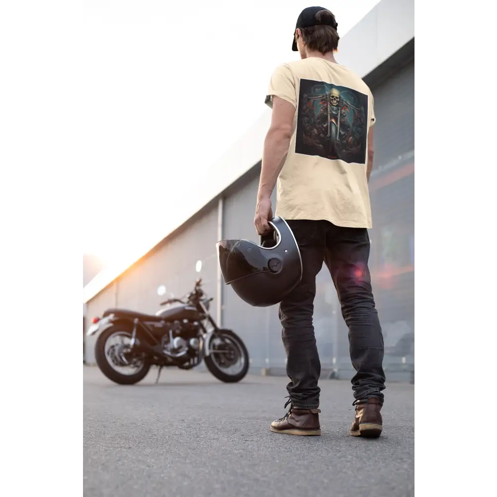 Motorcyclist in off-white rider’s half sleeve t-shirt holding a helmet by motorcycle