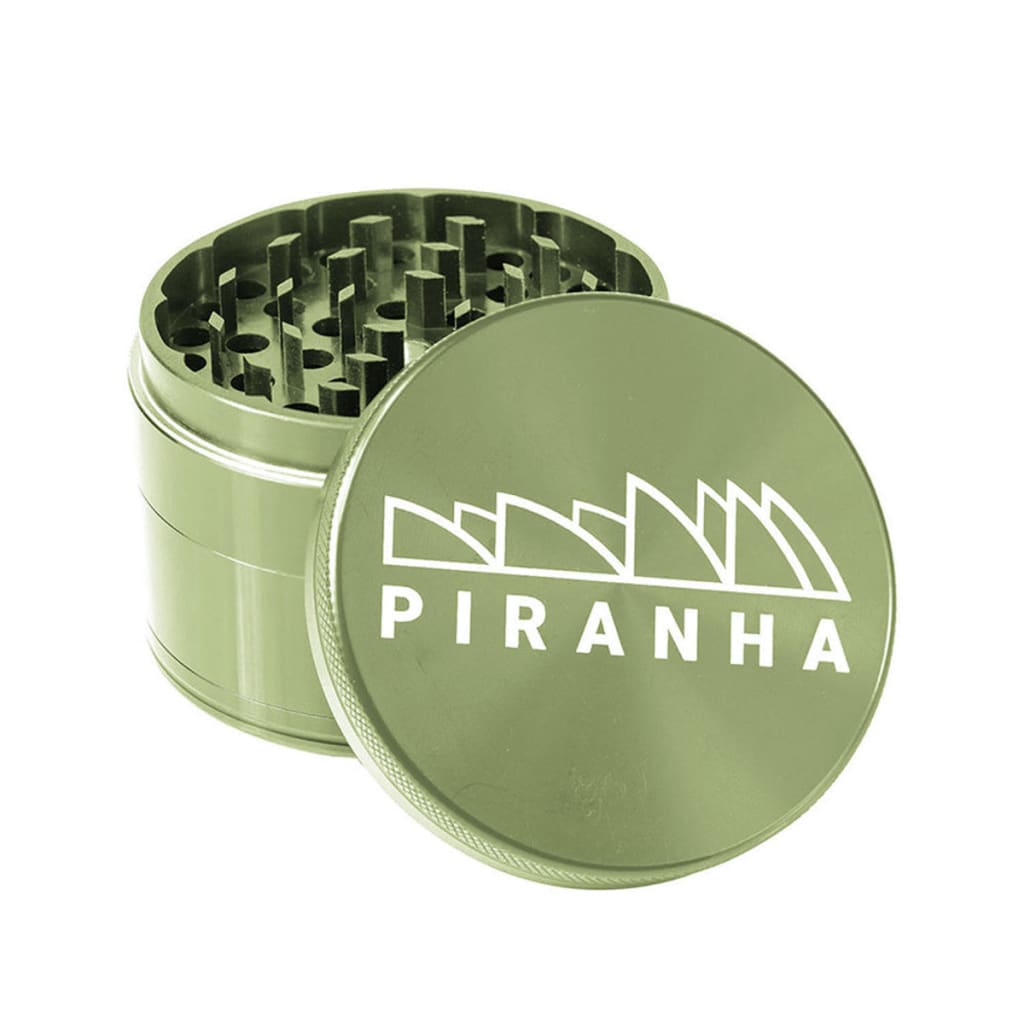 Olive green Piranha aluminum grinder with razor sharp teeth and strong magnetic lid