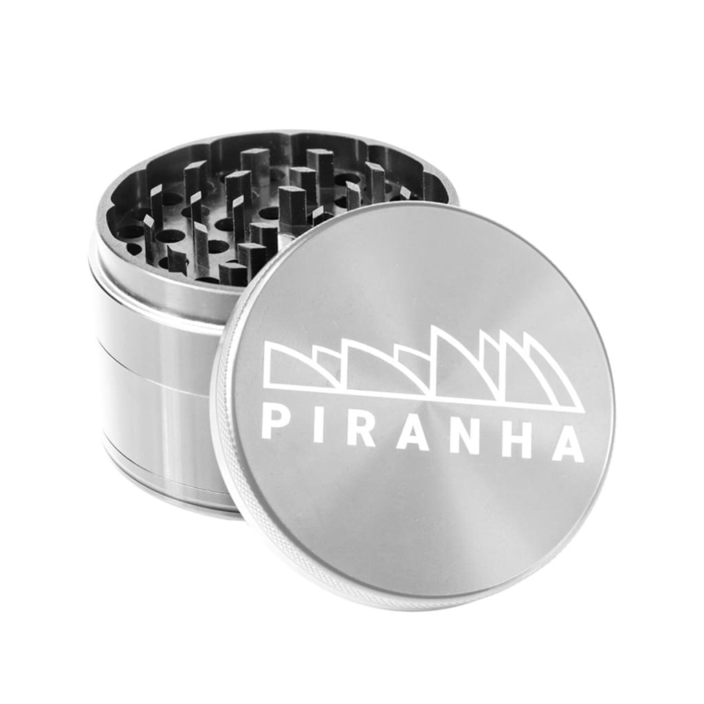 Silver Piranha aluminum grinder with razor sharp teeth and strong magnetic lid