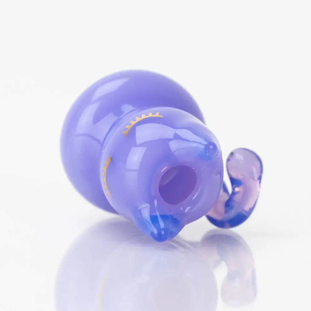 Translucent lavender Sakibomb Kitty Carb Cap with gold leaf detailing