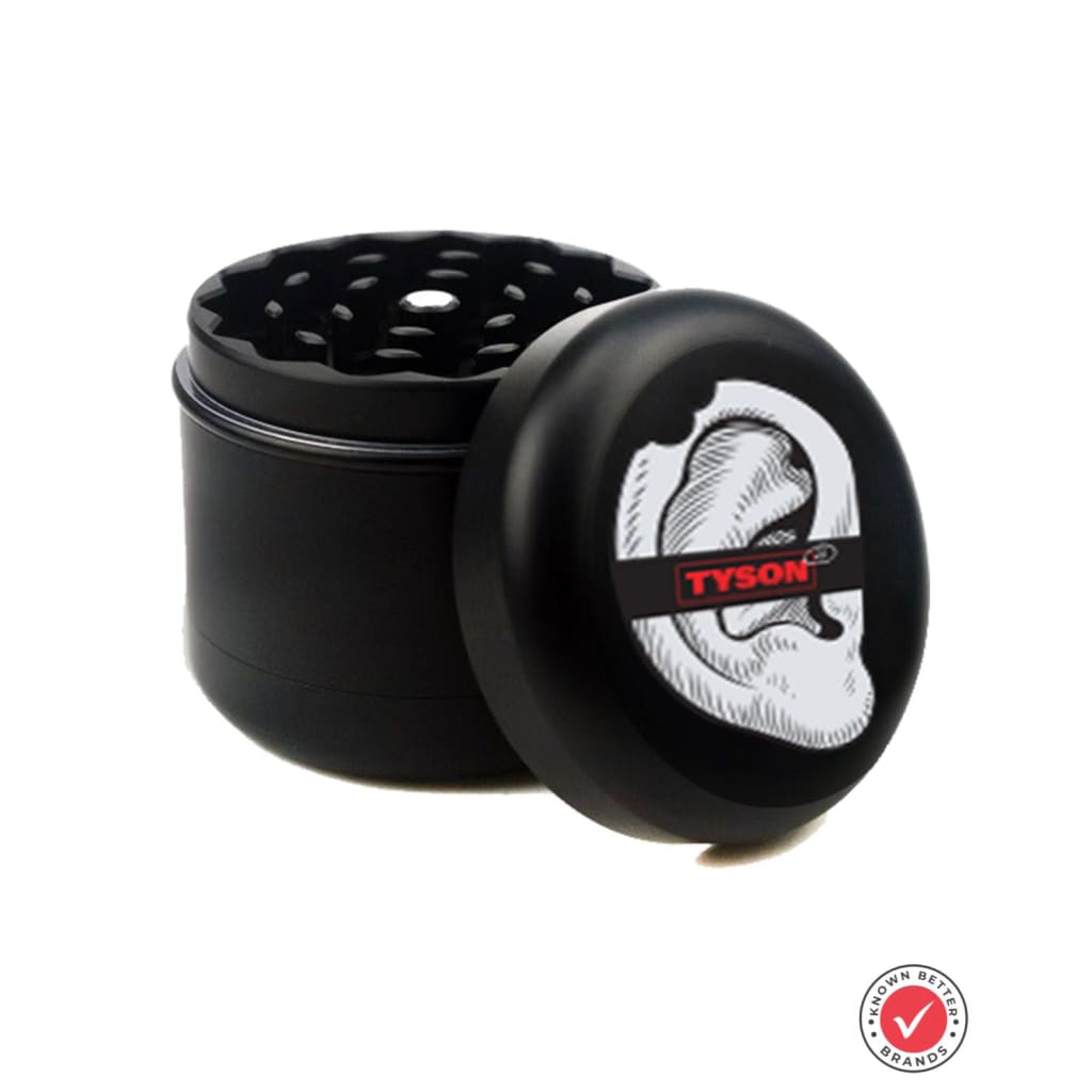 Black herb grinder with Tyson branding and bitten ear illustration on lid