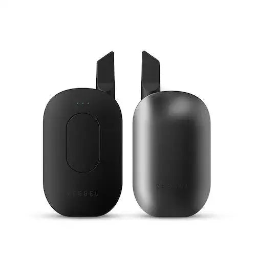 Vessel Compass cartridge battery with black sleek oval wireless charging pads