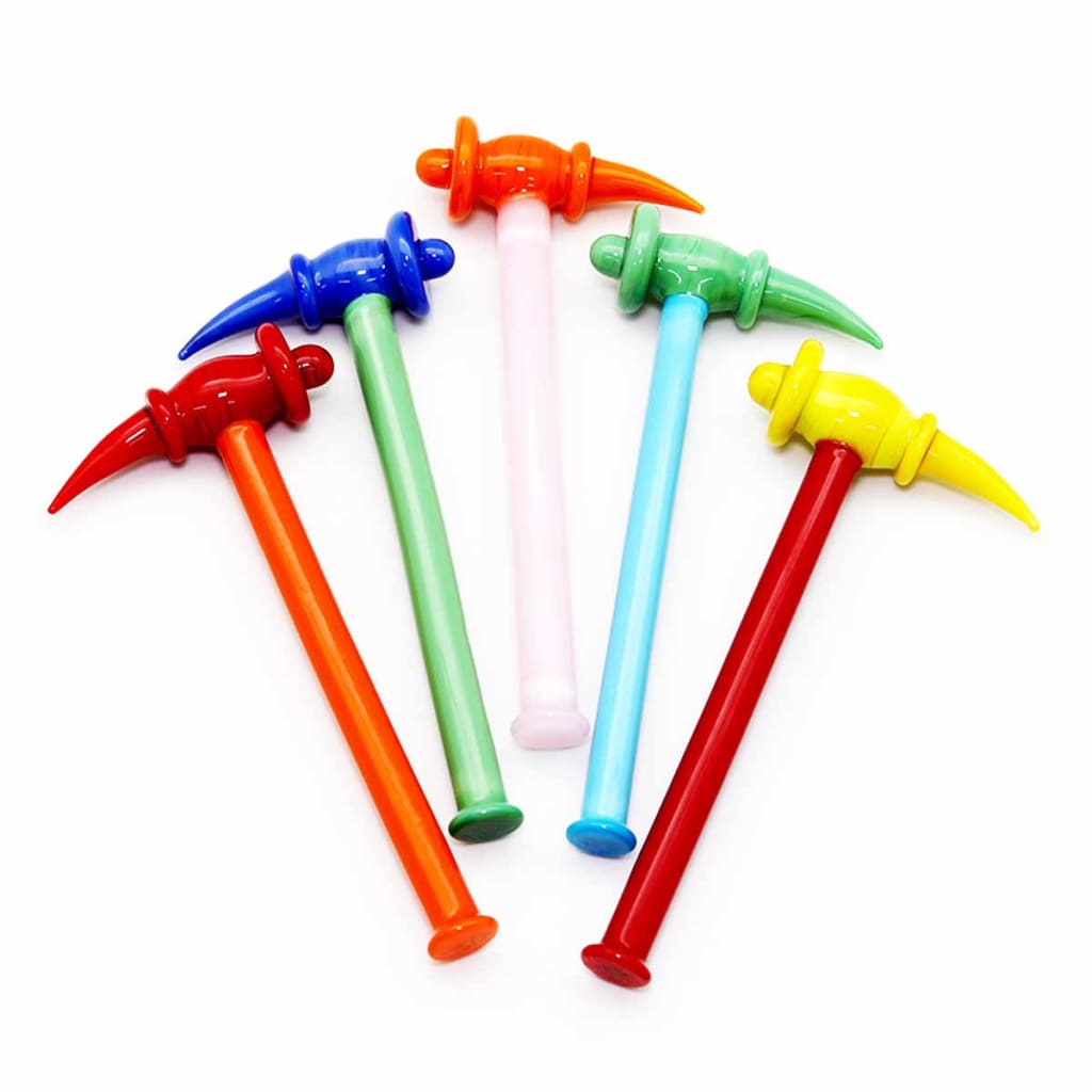 Colorful dinosaur-head hammers in fan pattern on American Glass Dabber Slate Hammer Carb Cap