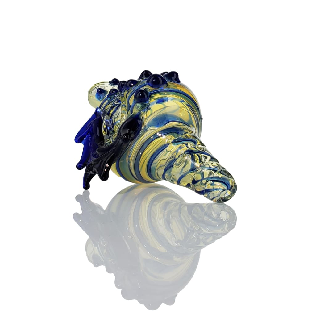 Swirled borosilicate glass sculpture resembling a seashell; Maroon Conch Shell Pipe