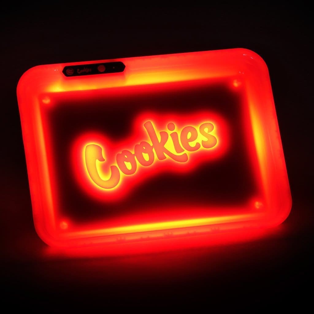 Red illuminated acrylic single rolling tray with orange cookies script and USB-C port