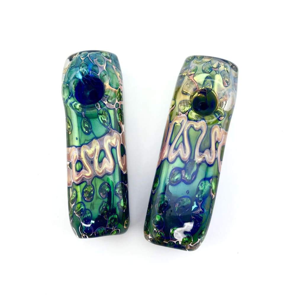 Two decorative glass beads on a fumed painted steamroller with inside-out works technique