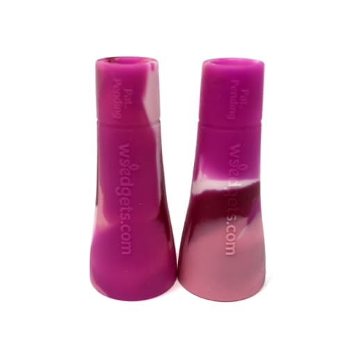 Two pink and purple swirled plastic salt and pepper shakers for perfect roach clip weed pipes