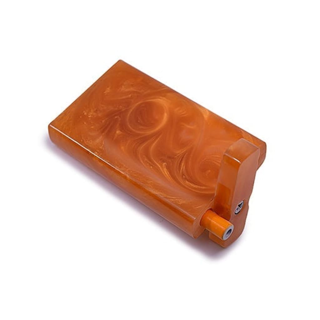 Orange plastic soap dispenser with a swirled pattern from Handmade Acrylic Dugouts collection