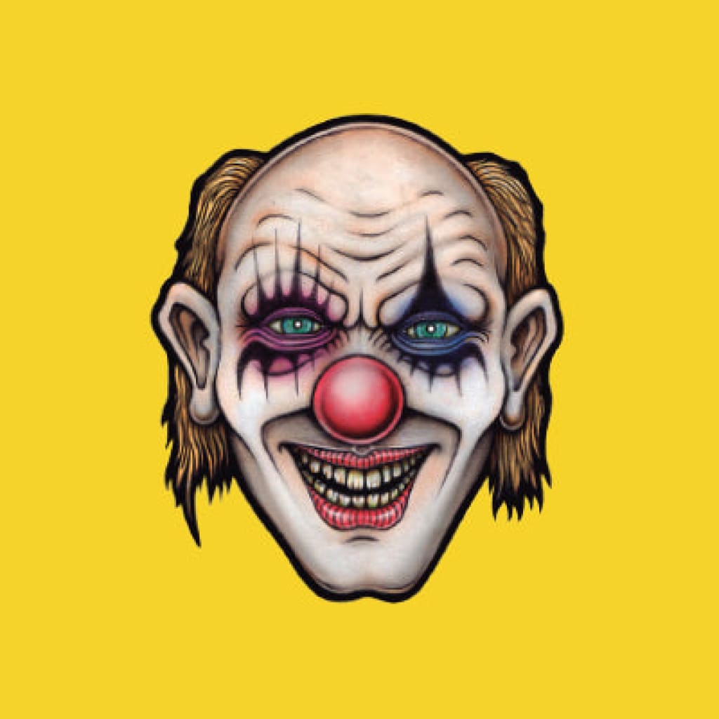 Menacing clown face on Lion Rolling Circus Silver Line rolling papers