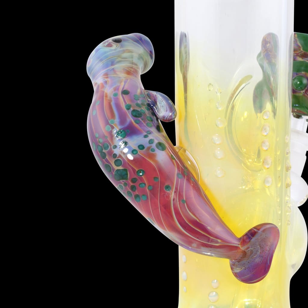 Manatee Glass Water Pipe with Mercury Seal, featuring green color change and swirling patterns