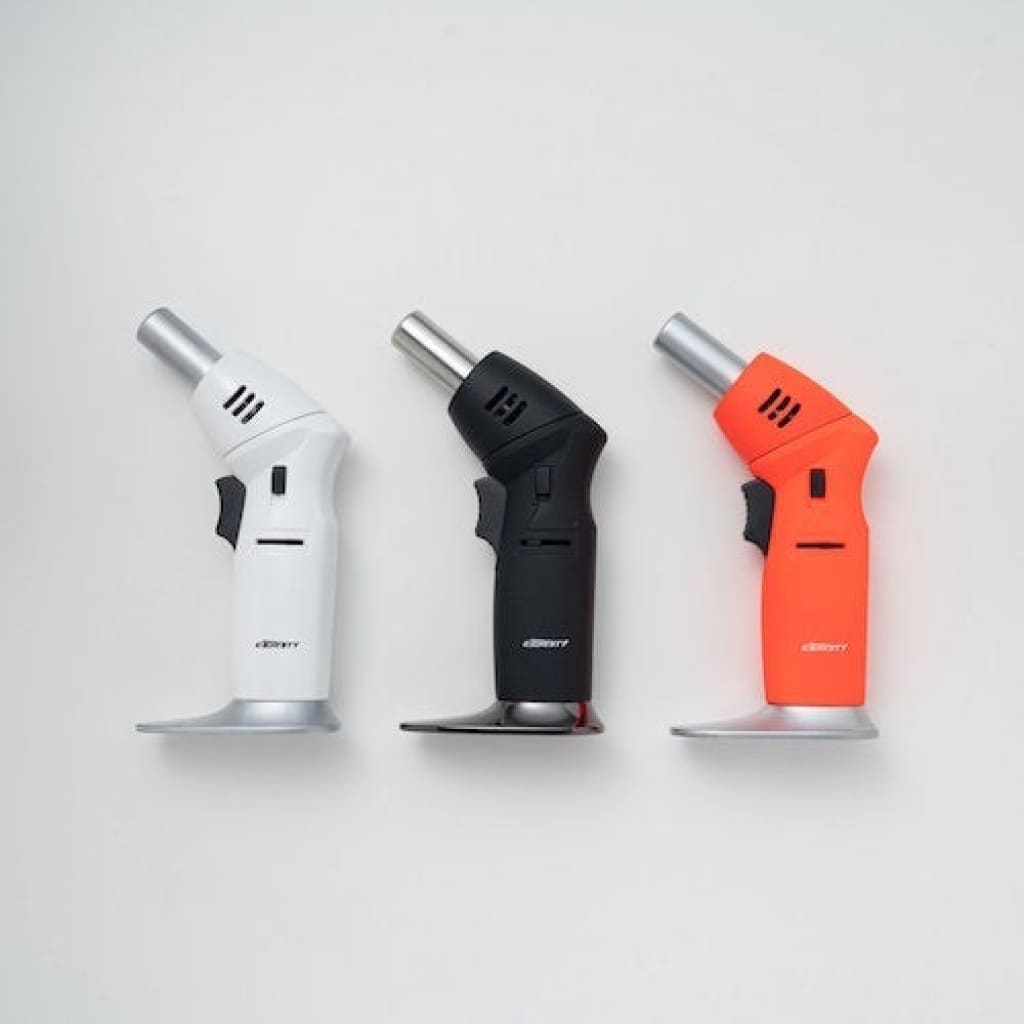 Maven Limited Edition Original Torch with Unique Adjustable Angle, three compact ergonomic butane torches in white, black, orange with silver tips and bases