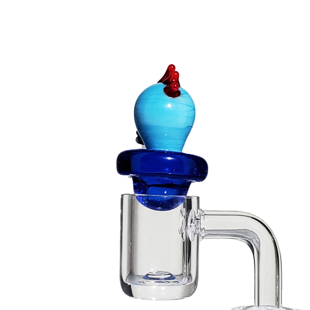 Vibrant blue Mr. Meeseeks carb cap dab rig from Lion Rolling Circus