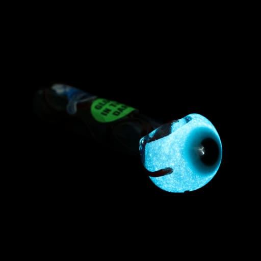 Glowing blue eye-shaped eyeball glass pipe with straight color change