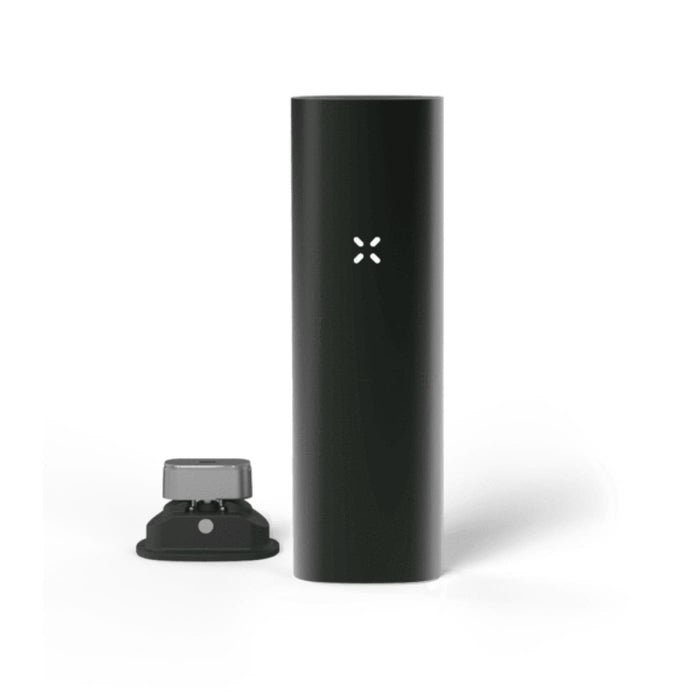 Black Pax 3 portable cannabis vaporizer with charging dock and oven lid
