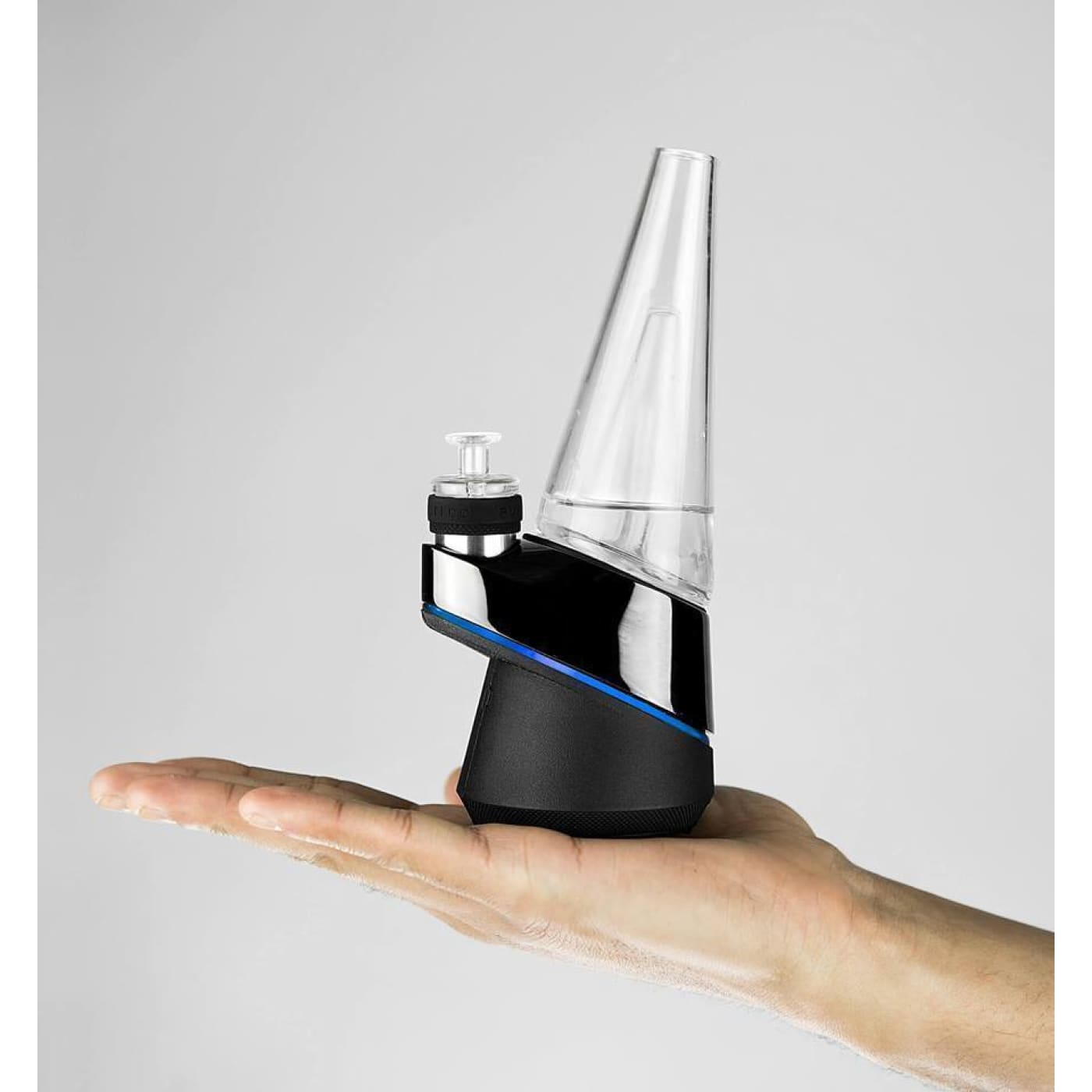 Black and chrome electronic rig showcasing Puffco Peak Vaporizer for potent concentrate flavor