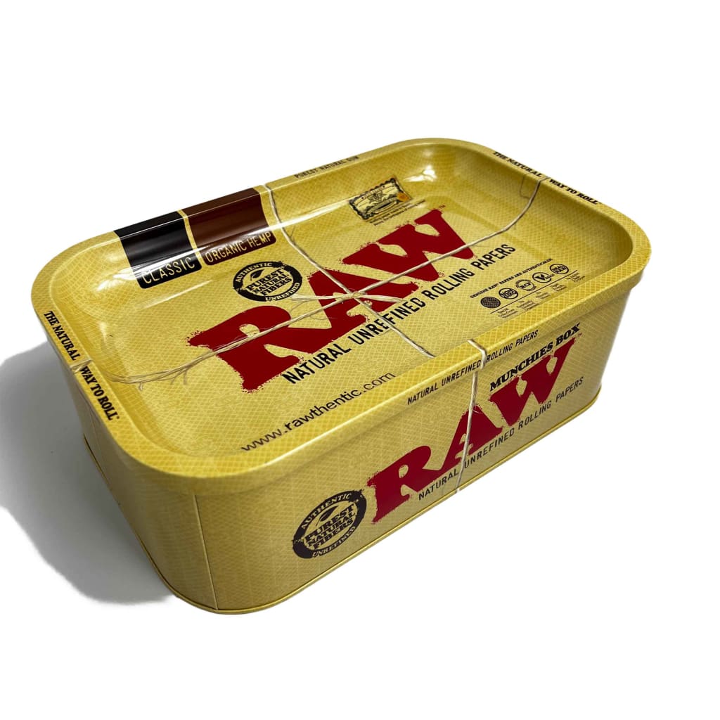 Yellow metallic Raw Munchies Box rolling tray with bold red raw branding for natural unrefined rolling papers