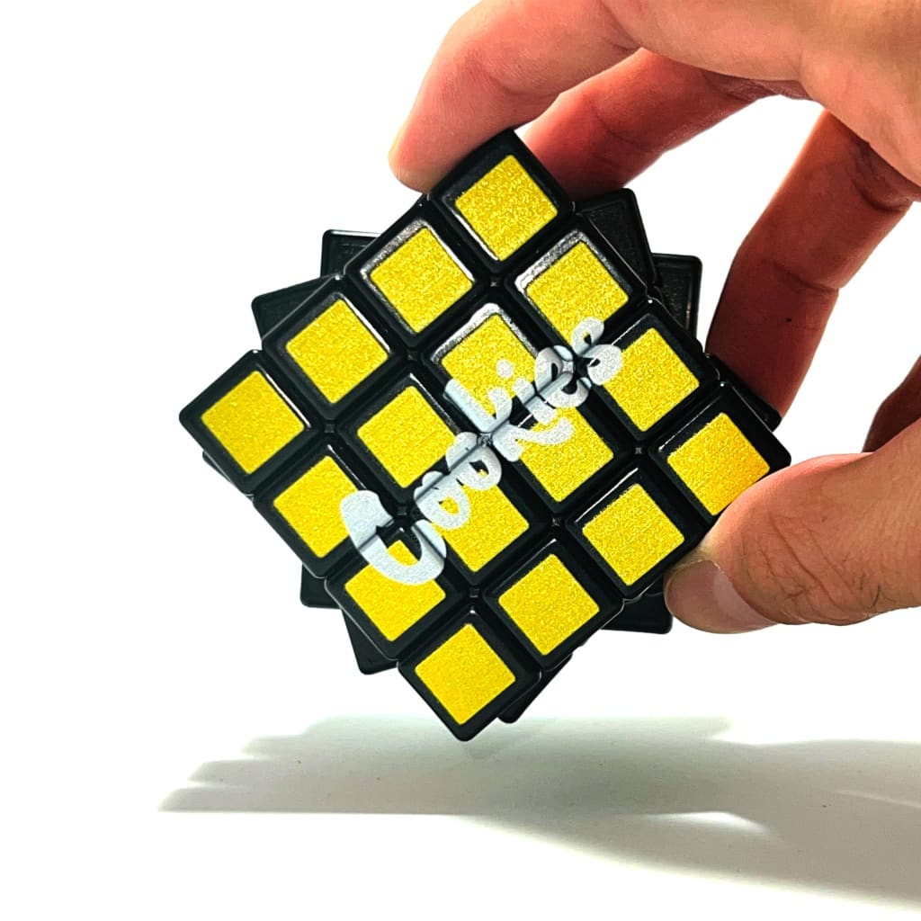 Yellow and black puzzle cube showcasing Neodymium magnetic connections for retro game enthusiasts