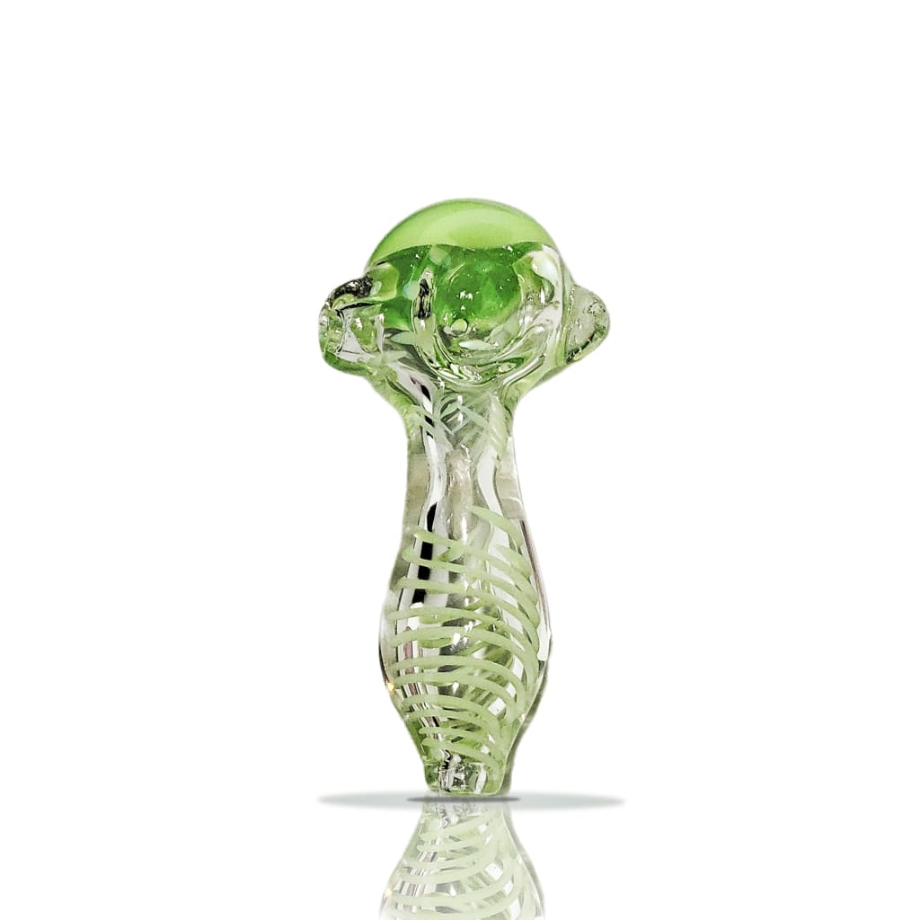 Green mushroom-shaped handmade glass pipe with intricate skeletal design and color-changing feature
