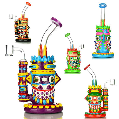 Colorful Aztec art water pipe rig with whimsical monster designs and 14mm male banger
